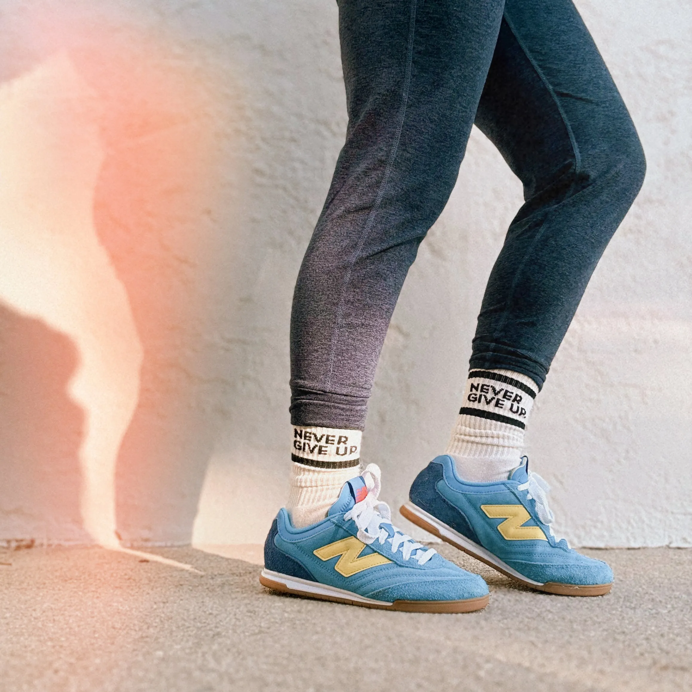 NEVER GIVE UP. STRIPED CREW SOCKS